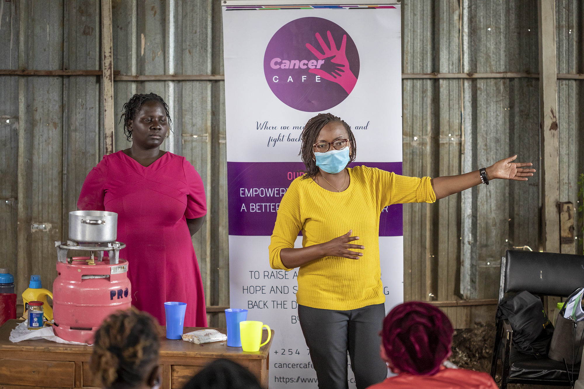 2.1.43 Woman Presenting Ygap Cancer Café Kenya Copyright Sven Torfinn Panos